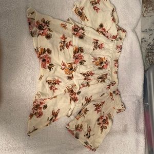 A jella c. M. Cream colored shirt with layers